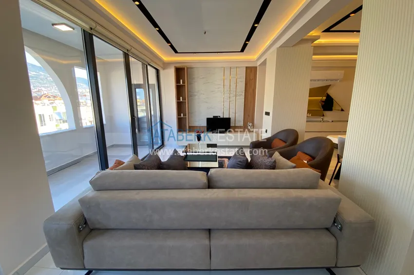 Purchase  Three-room apartment in the center of Alanya with an author's interior and an open view of the mountains 12 