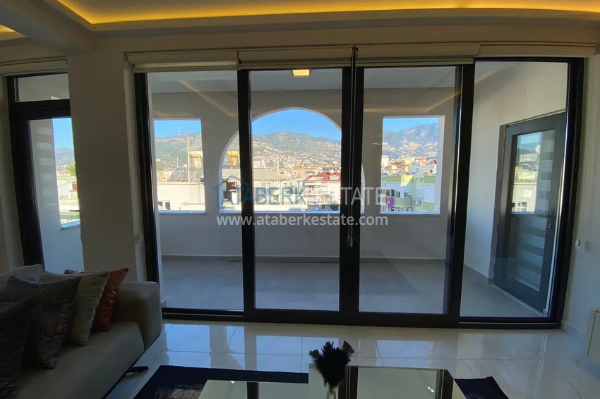 Purchase  Three-room apartment in the center of Alanya with an author's interior and an open view of the mountains 14 