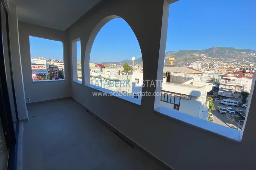 Purchase  Three-room apartment in the center of Alanya with an author's interior and an open view of the mountains 16 