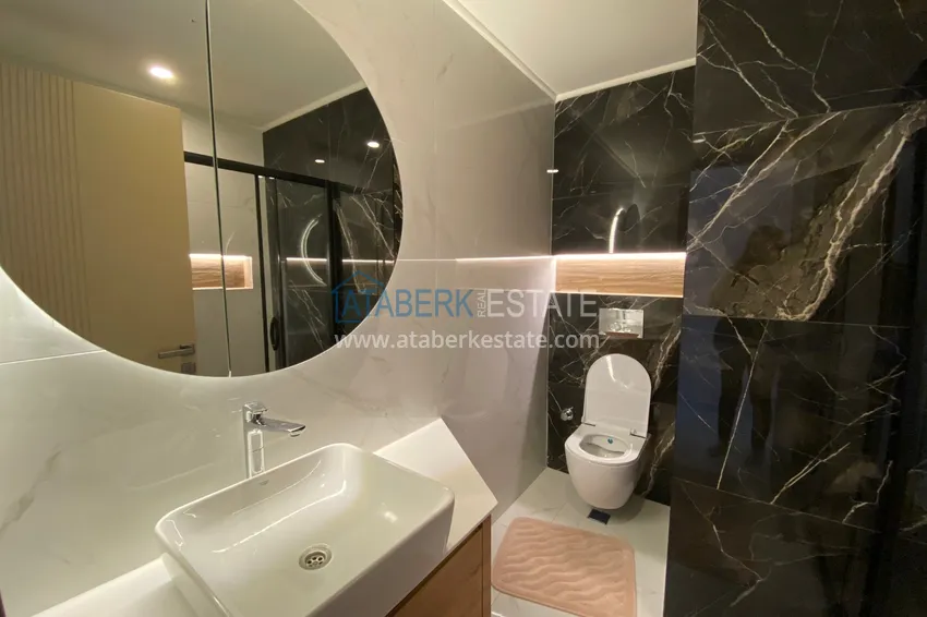 Purchase  Three-room apartment in the center of Alanya with an author's interior and an open view of the mountains 19 