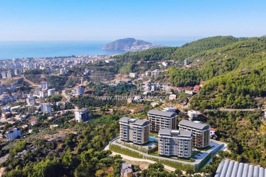 A new stylish investment project at the excavation stage in Oba, Alanya 1 