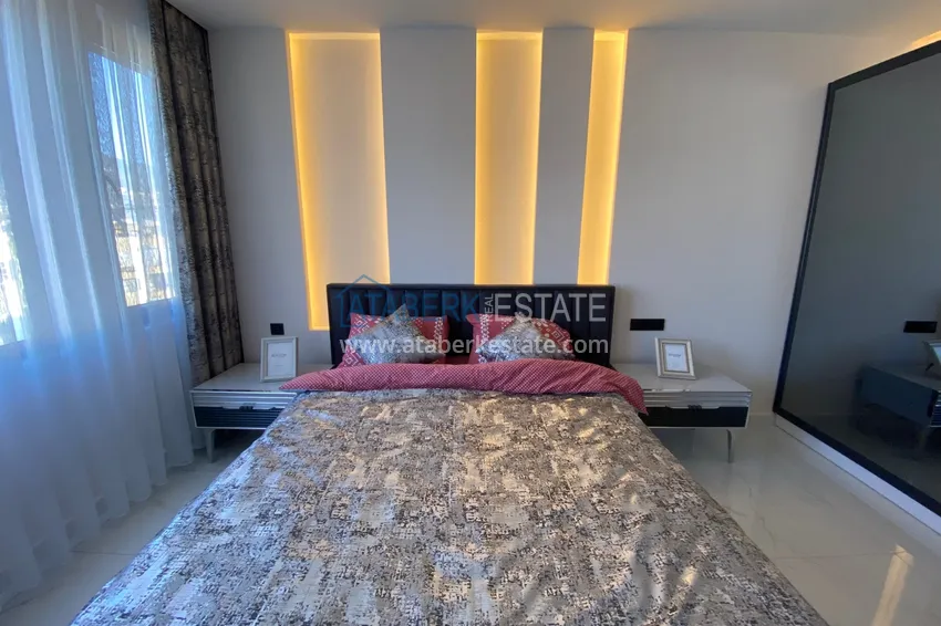 Purchase  Three-room apartment in the center of Alanya with an author's interior and an open view of the mountains 22 