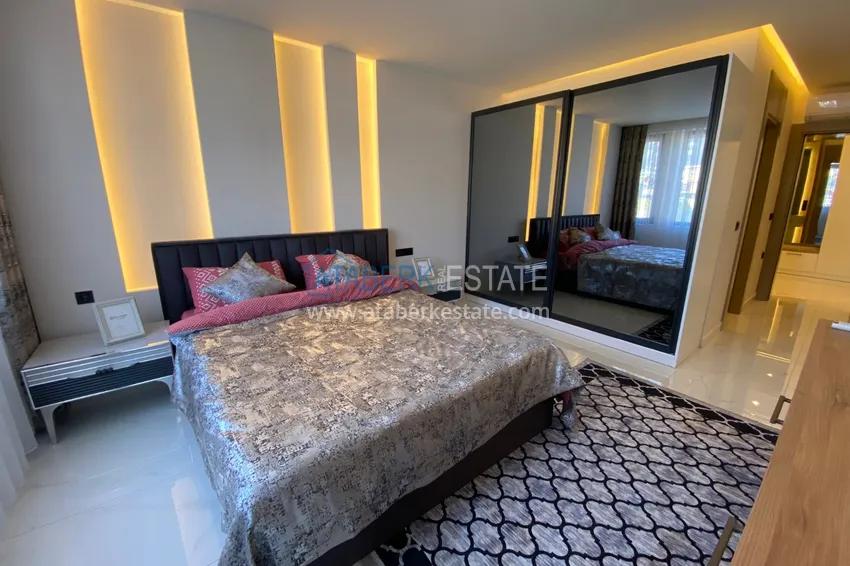 Purchase  Three-room apartment in the center of Alanya with an author's interior and an open view of the mountains 23 