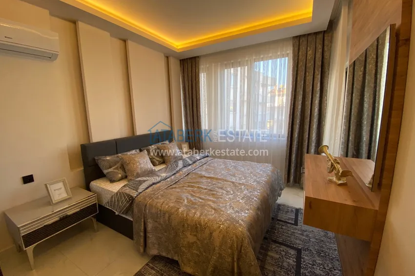 Purchase  Three-room apartment in the center of Alanya with an author's interior and an open view of the mountains 25 