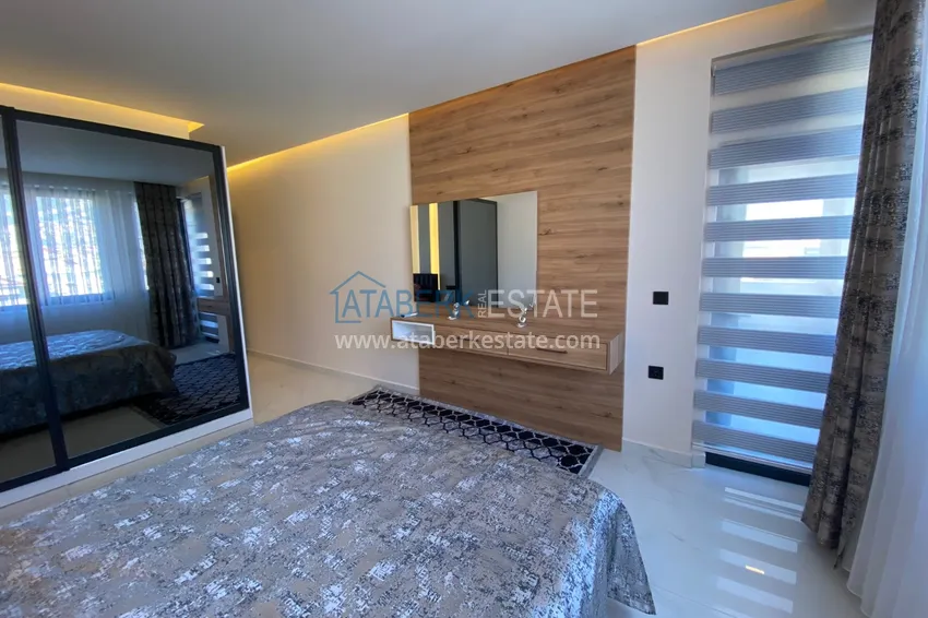 Purchase  Three-room apartment in the center of Alanya with an author's interior and an open view of the mountains 27 