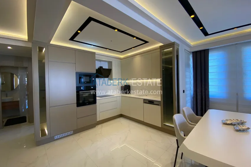 Purchase  Three-room apartment in the center of Alanya with an author's interior and an open view of the mountains 5 