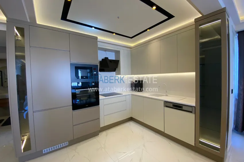 Purchase  Three-room apartment in the center of Alanya with an author's interior and an open view of the mountains 6 