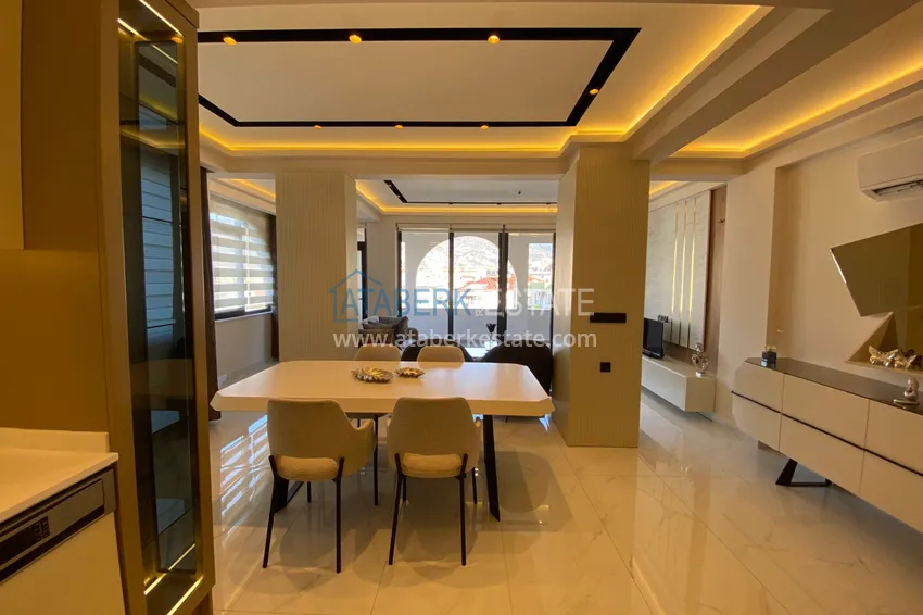 Purchase  Three-room apartment in the center of Alanya with an author's interior and an open view of the mountains 7 