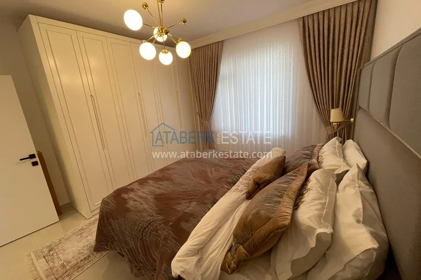 Purchase Apartment 2 + 1 after renovation with new furniture on the first coastline in the Tosmur area 16 