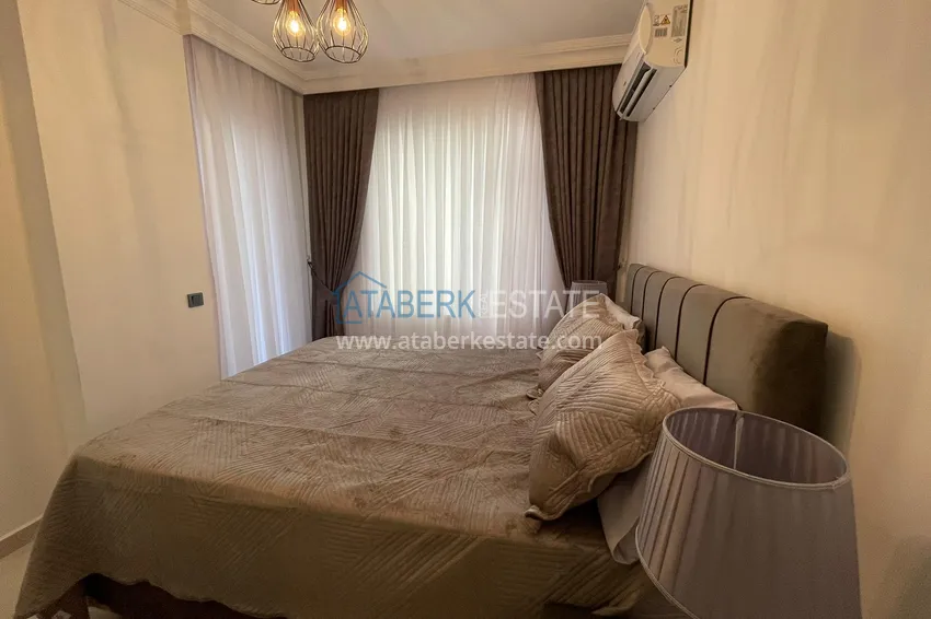 Purchase Apartment 2 + 1 after renovation with new furniture on the first coastline in the Tosmur area 17 