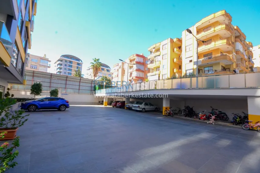 Apartment 2 + 1 in the center of Alanya with furniture and sea views in a complex with infrastructure 4 