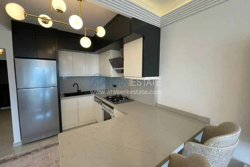 Purchase Apartment 2 + 1 after renovation with new furniture on the first coastline in the Tosmur area 5 