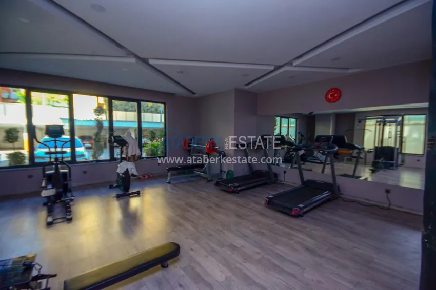 Apartment 2 + 1 in the center of Alanya with furniture and sea views in a complex with infrastructure 7 