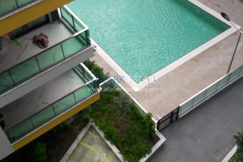 Purchase Apartment 2 + 1 in the center of Alanya with furniture and sea views in a complex with infrastructure 9 