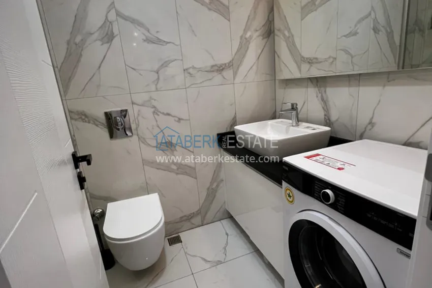 Purchase Apartment 1 + 1 with furniture in a new modern complex, the center of Alanya 12 