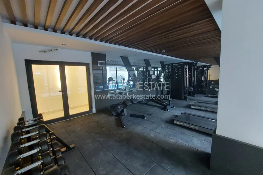 Apartment 1 + 1 with furniture in a new modern complex, the center of Alanya 7 