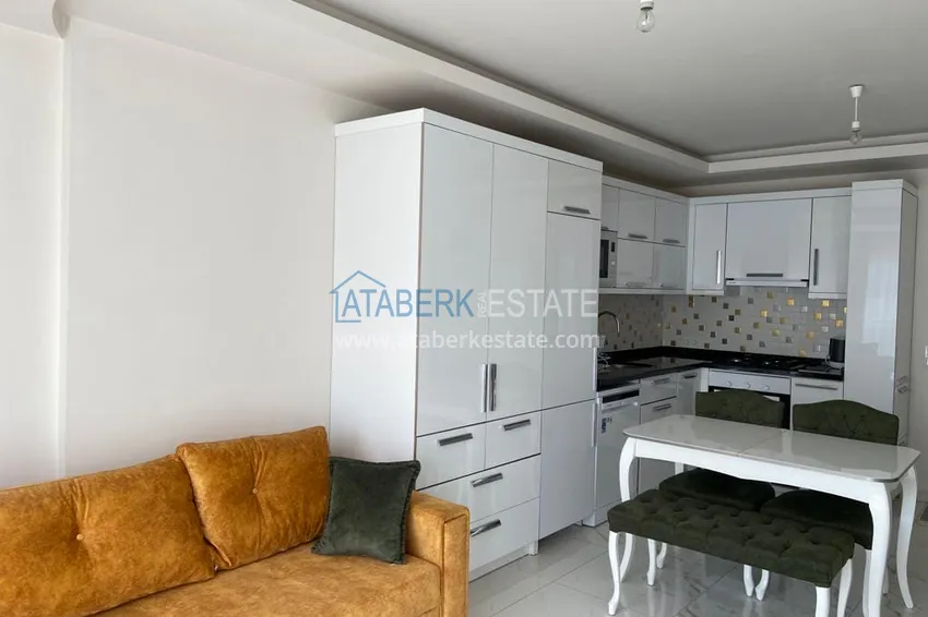 Purchase 1+1 apartment for rent with access to the garden in the resort area of Alanya - Avsallar 1