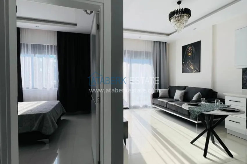 Purchase  1+1 furnished apartment with sea view, Kargicak area - Alanya 2 
