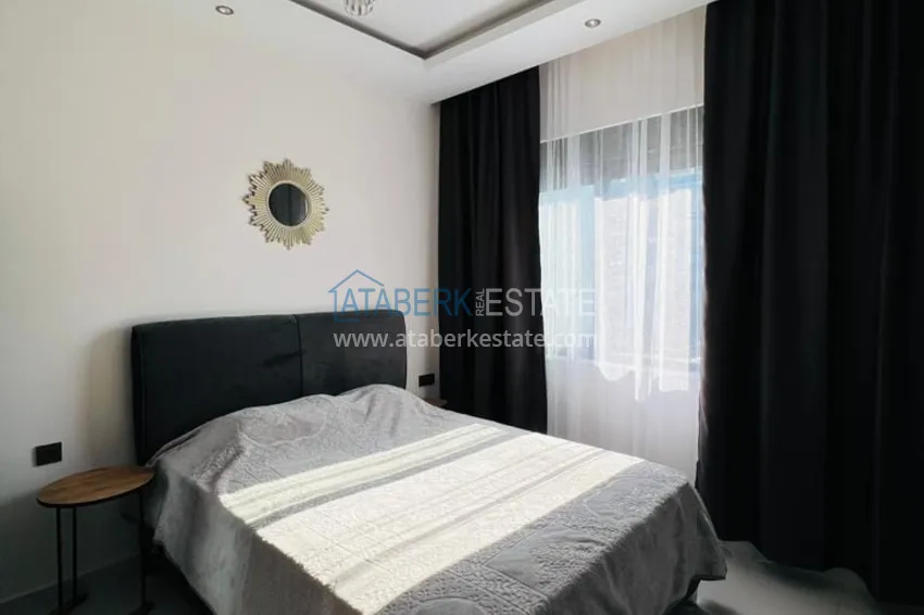 Purchase  1+1 furnished apartment with sea view, Kargicak area - Alanya 8 