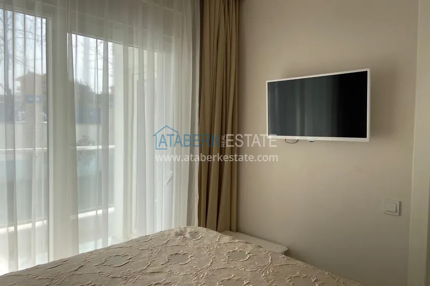 Purchase 1+1 apartment for rent with access to the garden in the resort area of Alanya - Avsallar 9