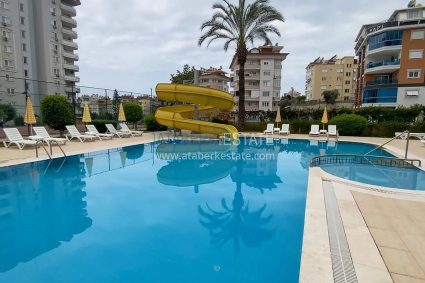 Furnished 1 + 1 apartment with a glazed balcony overlooking the sea, mountains and Kale in Cikcilli, Alanya 2 