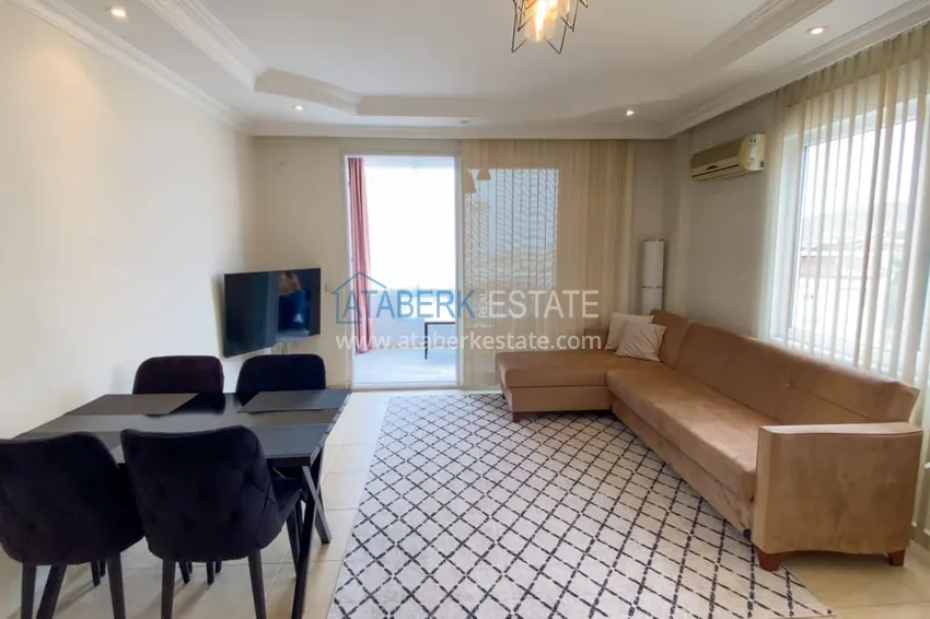 Purchase  Furnished 1 + 1 apartment with a glazed balcony overlooking the sea, mountains and Kale in Cikcilli, Alanya 3 