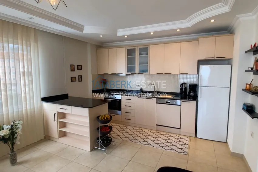 Purchase  Furnished 1 + 1 apartment with a glazed balcony overlooking the sea, mountains and Kale in Cikcilli, Alanya 4 