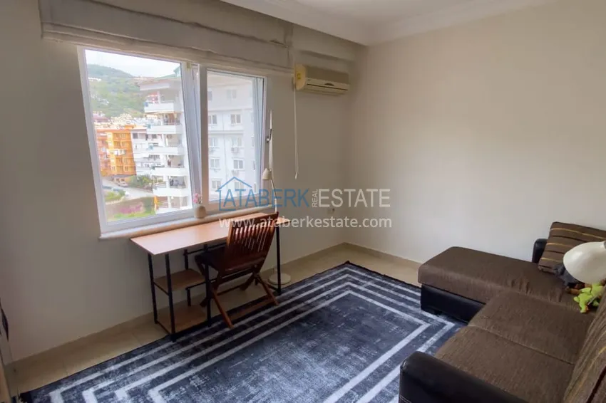 Purchase  Furnished 1 + 1 apartment with a glazed balcony overlooking the sea, mountains and Kale in Cikcilli, Alanya 7 