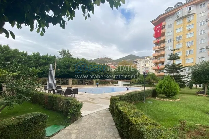 Apartment 1 + 1 with furniture and mountain views in a complex with infrastructure, the center of Alanya 1 