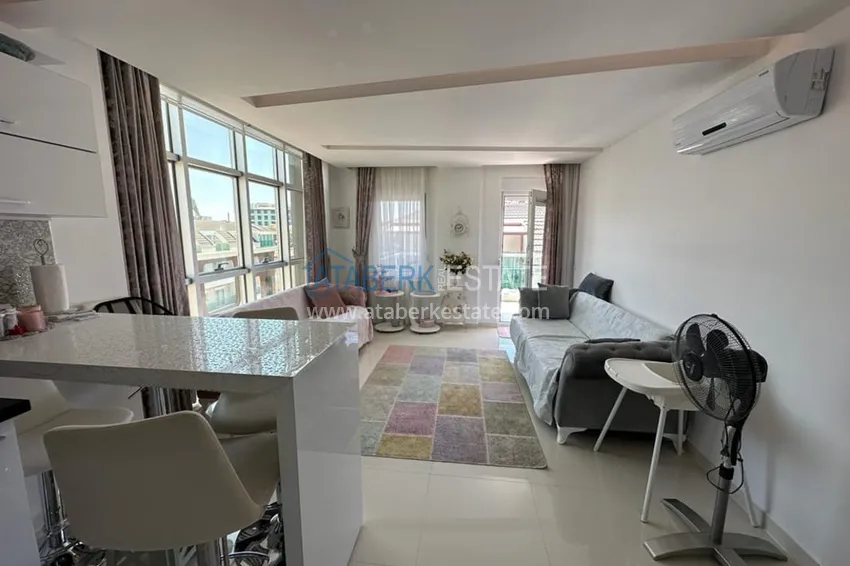 Purchase  1+1 penthouse for rent in the center of Alanya in an exclusive residential complex  2 