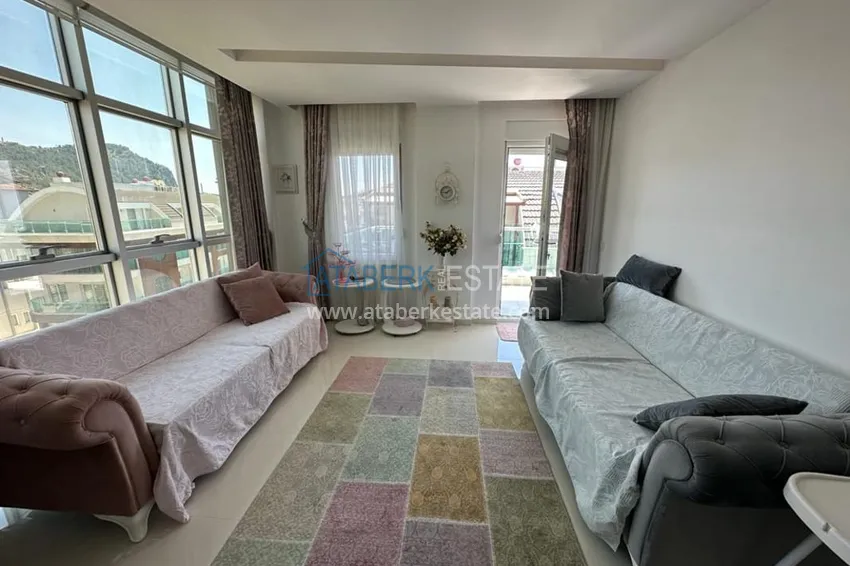 Purchase  1+1 penthouse for rent in the center of Alanya in an exclusive residential complex  3 