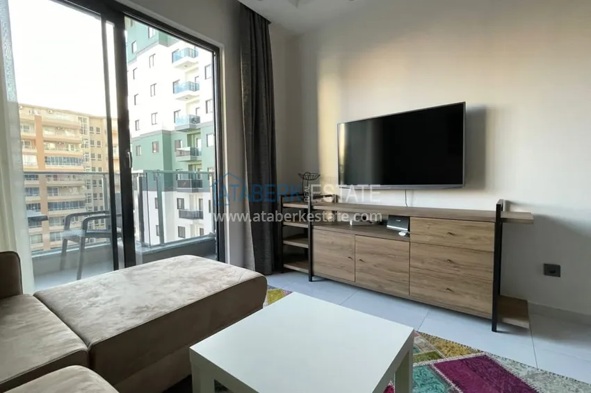Purchase  1+1 apartment for rent in Mahmutlar in a complex with A94 hotel infrastructure 3 