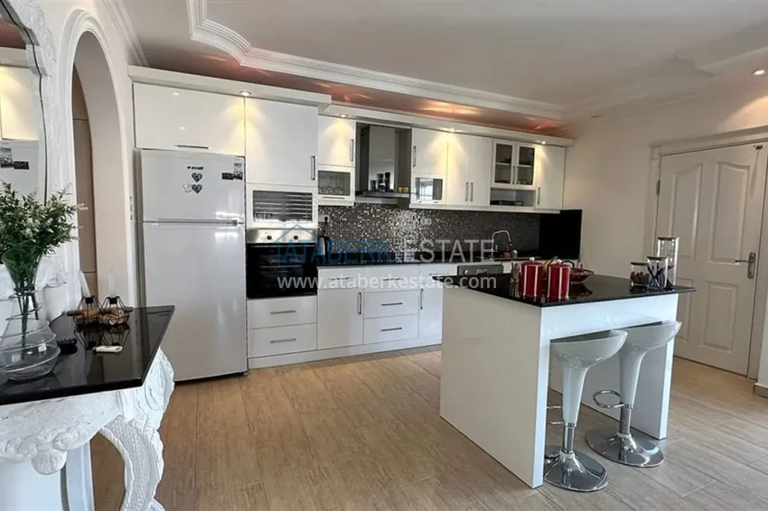 Purchase 2+1 apartment with furniture and a glazed balcony in Alanya - Cikcilli district 3 