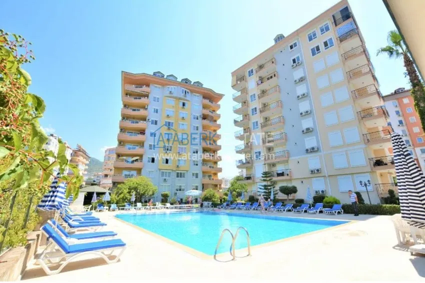 Apartment 1 + 1 with furniture and mountain views in a complex with infrastructure, the center of Alanya 5 