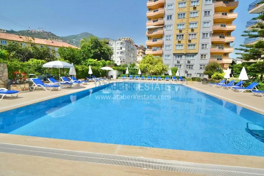 Apartment 1 + 1 with furniture and mountain views in a complex with infrastructure, the center of Alanya 6 