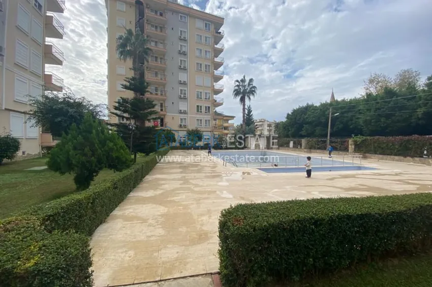 Apartment 1 + 1 with furniture and mountain views in a complex with infrastructure, the center of Alanya 7 