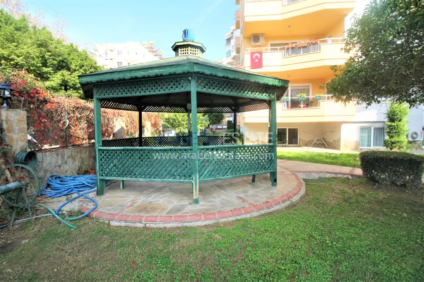 Apartment 1 + 1 with furniture and mountain views in a complex with infrastructure, the center of Alanya 10 