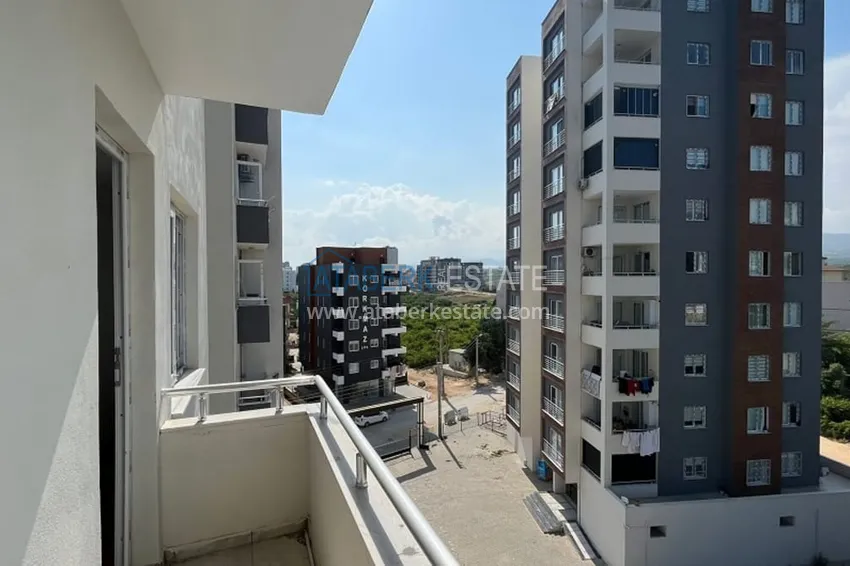 Purchase  Apartment 2 + 1 with a separate kitchen 500 meters from the sea in the Davultepe-Mersin area 25 