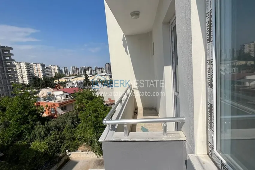 Purchase  Apartment 2 + 1 with a separate kitchen 500 meters from the sea in the Davultepe-Mersin area 26 