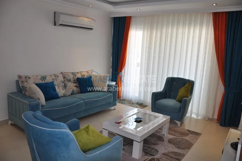 Purchase Apartment 1+1 furnished with a glazed balcony and sea views, Avsallar area - Alanya 1