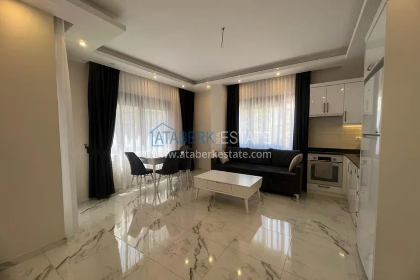 Purchase One-bedroom apartment for rent in the center of Alanya - Keykubat Beach area in a new modern complex 1 
