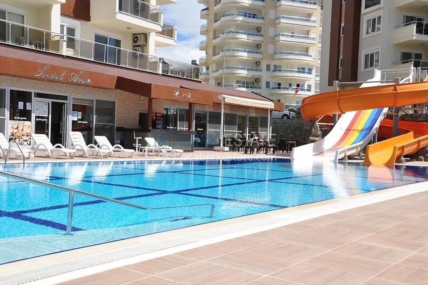 Apartment 1+1 furnished with a glazed balcony and sea views, Avsallar area - Alanya 7