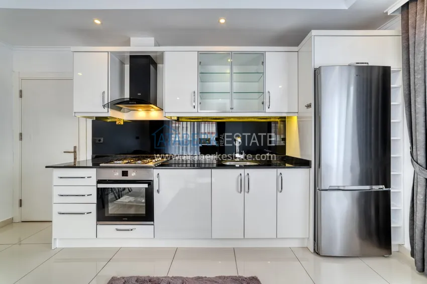 Purchase Furnished 2+1 apartment for sale in the center of Alanya just 100 meters from the beach 7