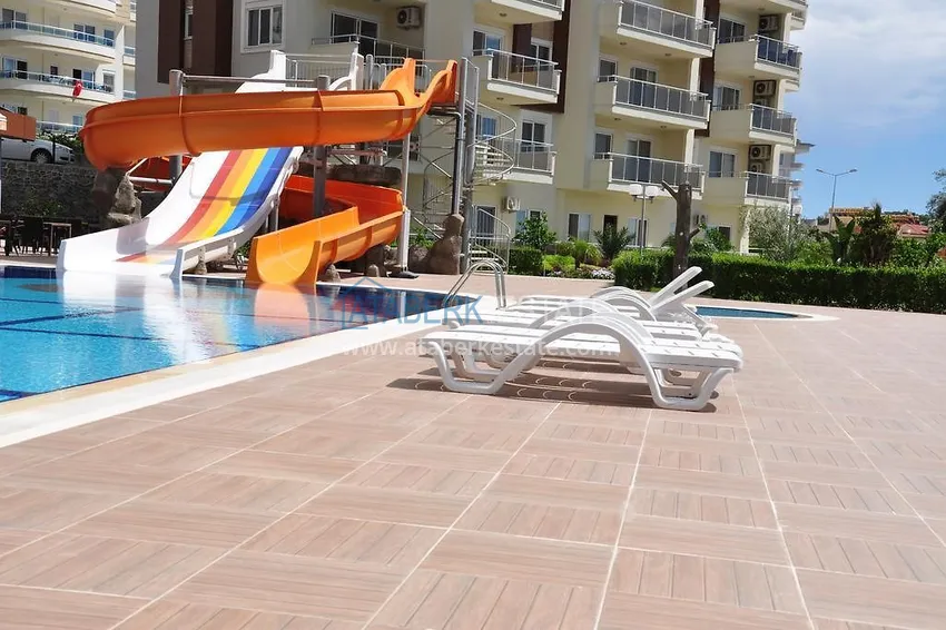 Apartment 1+1 furnished with a glazed balcony and sea views, Avsallar area - Alanya 8