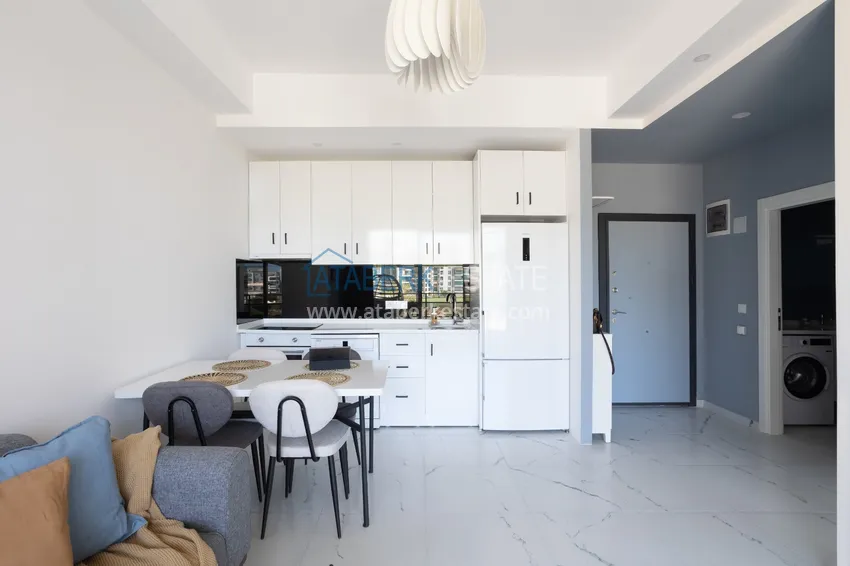 Purchase  Apartment 1+1 furnished with designer interior in a new building, Avsallar area - Alanya. Suitable for short term rental 10 