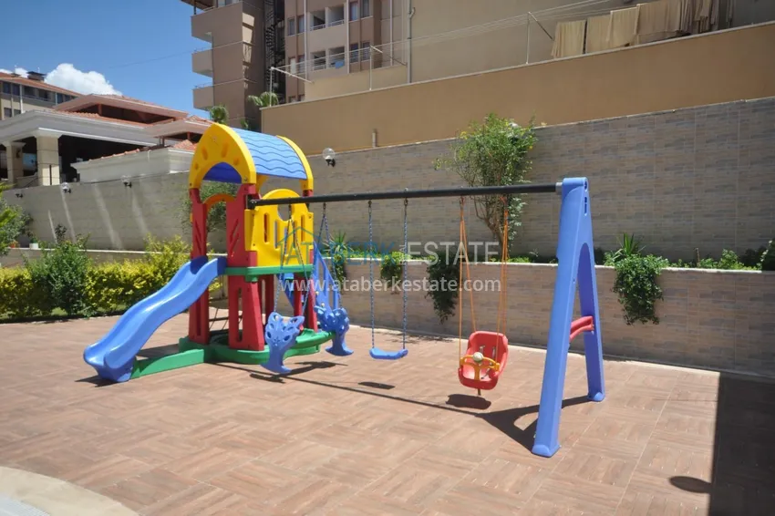 \ Apartment 2 + 1 furnished in a residential complex on the first coastline, Tosmur area - Alanya 14 