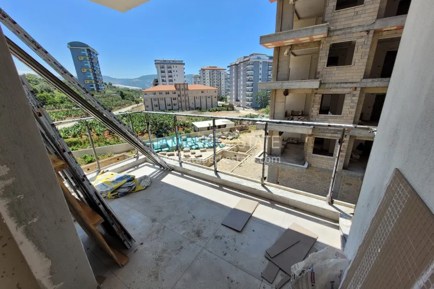 Purchase Finished two-bedroom apartment in a complex under completion in Mahmutlar 13