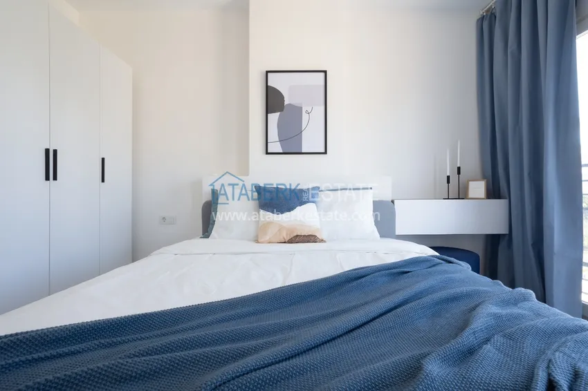 Purchase  Apartment 1+1 furnished with designer interior in a new building, Avsallar area - Alanya. Suitable for short term rental 15 