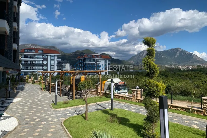 Purchase  1+1 apartment with furniture and mountain views in a modern boutique complex, Oba district — Alanya 15 