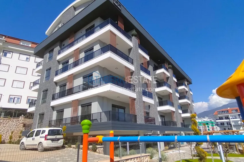 1+1 apartment with furniture and mountain views in a modern boutique complex, Oba district — Alanya 1 